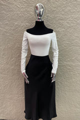 Falda Midi Satinada Negra